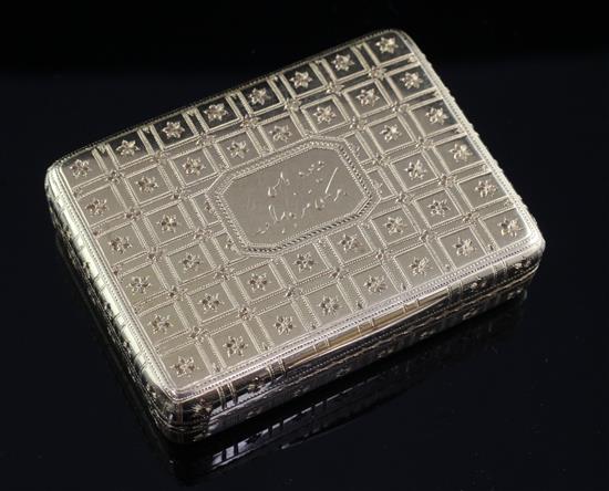 A George III bright cut engraved 18ct gold rectangular snuff box, 2.5in.